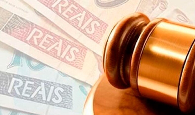 Beneficiária de justiça gratuita pagará custas por não justificar falta em audiência